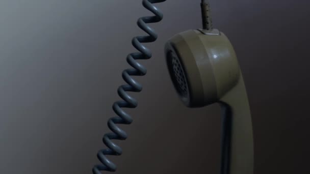 Vintage Rotary Phone Receiver Hanging Close Slow Motion Zoom Selective — Stock Video
