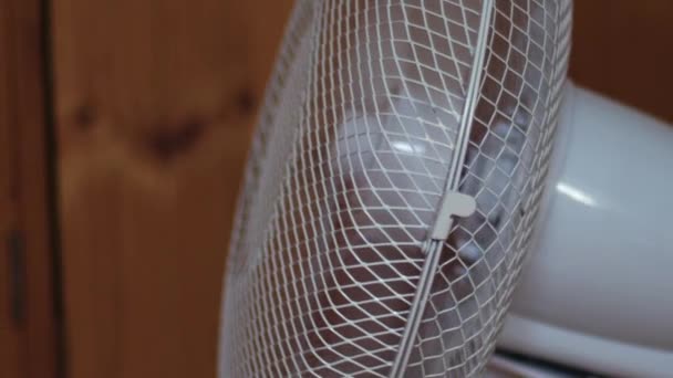 Office Desk Fan Circulating Air Slow Motion Medium Zoom Selective — Stock Video