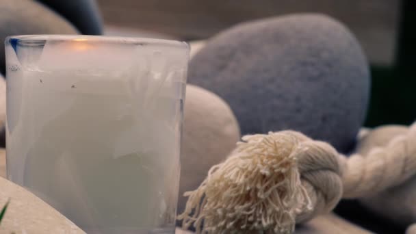 Relaxing Zen Candle Stones Meditation Display Close Zoom Slow Motion — Stock Video