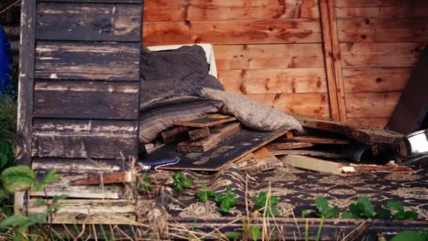 Homeless Sleeping Bag Derelict Shed Building Panning Zoom Selective Focus — Stock Video