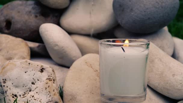 Relaxing Zen Candle Stones Meditation Display Close Slow Motion Selective — Stock Video