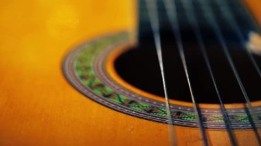 Classical guitar strings close up shot dolly 4k shot selective focus