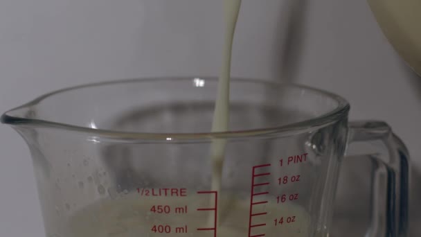 Jug Milk Glass Measuring Jug White Background Medium Shot Selective — Stock Video