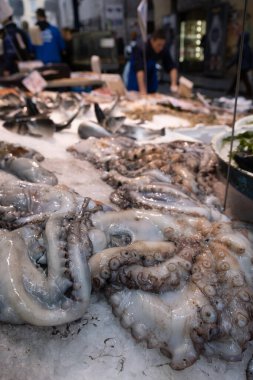 Octopus in open seamarket, Napoli clipart