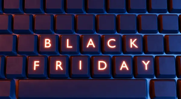 close-up of a computer keyboard with empty keys and the words BLACK FRIDAY illuminated on them. Concept of online shopping, internet and seasonal offers. 3d rendering