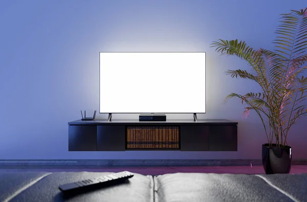 Modern bir oturma odasında aydınlatmalı ekranı olan bir televizyon ve üzerinde uzaktan kumanda olan kanepenin odak dışı görüntüsü. Dizi konsepti, filmler, ev sineması ve yayın platformları. 3d oluşturma
