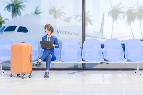 3D rendering of a businesswoman seated at an airport with a laptop and luggage by her side with a view of an airplane and palm trees in the background. Travel, business trip, or remote work concept.
