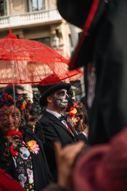 Barcelona, Catalonia, Spain, November 4, 2023 - Catrinas parade on the Rambla Catalunya celebrating the Mexican Day of the Dead. clipart