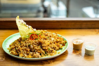 Geleneksel Peru yemeği Arroz şoförü denen Asya yemeğiyle kaynaşmış..