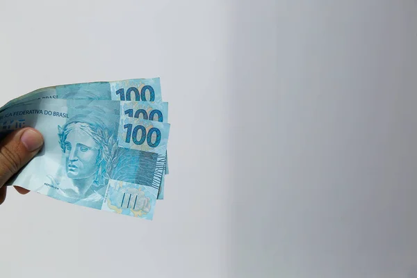 Brazil Pénz Halmozott Fehér Felületen Több Száz Valódi Bankjegy — Stock Fotó