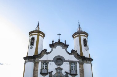 Oliveira, Minas Gerais, Brazil - February 24, 2023: facade and detail of the church tower our lady of Oliveira, in the city of Oliveira, Minas Gerais
