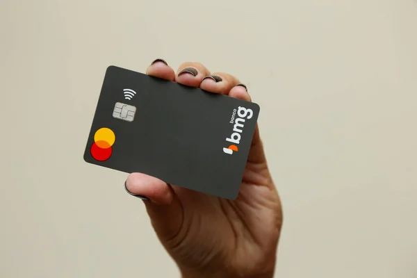 Stock image Minas Gerais, Brazil - March 22, 2023: BMG bank Mastercard logo credit card, , illustrative editorial image.