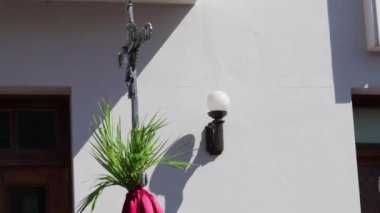 Kutsal hafta. İşlemsel haç ve dallar. Geleneksel Katolik kutlaması Palm Sunday. Hristiyan inancı Dini sembol.