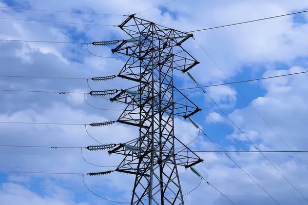 Electric power transmission tower and electrical power cables