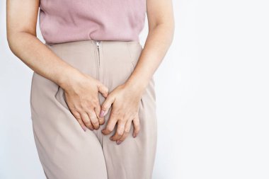 vaginal yeast infection concept woman suffering from itching and irritation in the vagina and vulva clipart