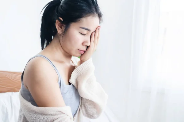 stock image Asian woman having headache, fever, dizzy and allergy side effects after receiving vaccination for covid-19