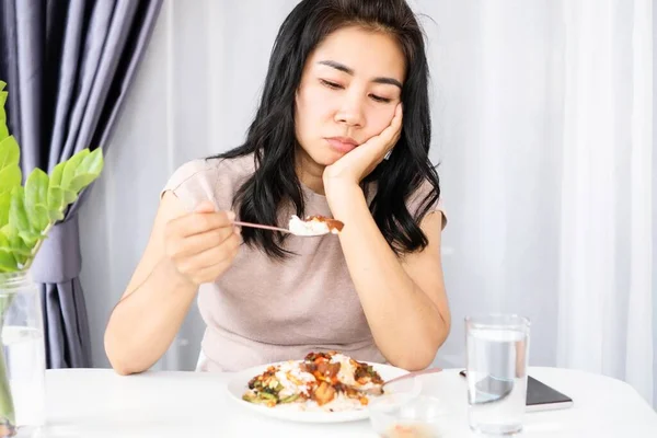 stock image Asian woman having problem with anorexia ,bored with food, and lost appetite