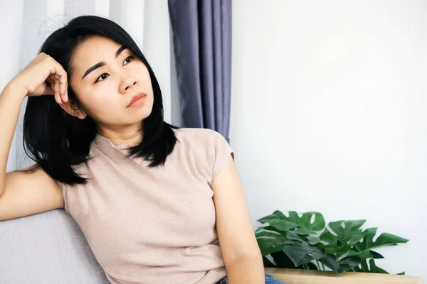 sad Asian woman over thinking lonely , unhappy with mental health, bad situation concept