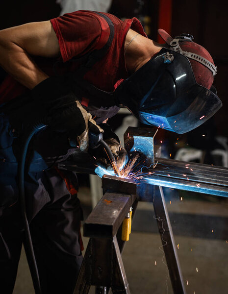 man welder, mig or tig welding, craftsman, erecting technical steel Industrial,  steel welder in factory technical