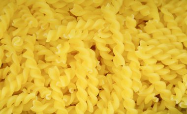 İtalyan Fusilli Makarna Makarnası arkaplanını veya dokusunu kapat.                               