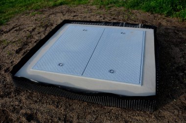 a hinged hatch with a patent lock to the underground of the city, where there are collector shafts with engineering networks. or the facility and subway entrance directly from the sidewalk