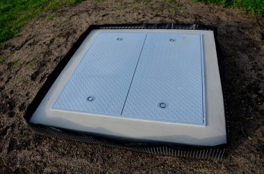 a hinged hatch with a patent lock to the underground of the city, where there are collector shafts with engineering networks. or the facility and subway entrance directly from the sidewalk