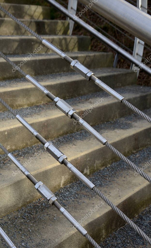 wire mesh fencing with a stainless steel guide wire and a tensioning