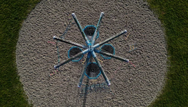 rope hemp net connected in a wooden frame by means of metal stainless steel connectors. it is an attraction for children on the playground. sand, screw, terrace, clambering, net, mesh , log, above