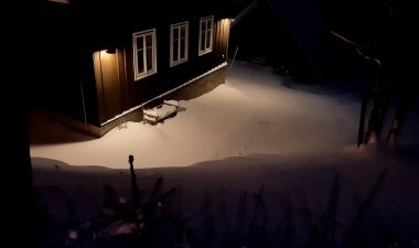 the evening before Christmas cottages. windows and lamps let in a warm orange light and turn the snow yellow. snowmen are waiting for children in the garden. Christmas Nativity Comet Star of Led 