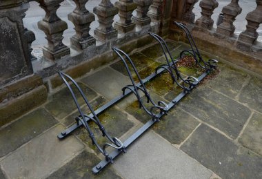 beige stone railing of a historic building balustrade reminiscent of a skittles walkway of granite cubes row, paving, balcony, terrace, house, repetition