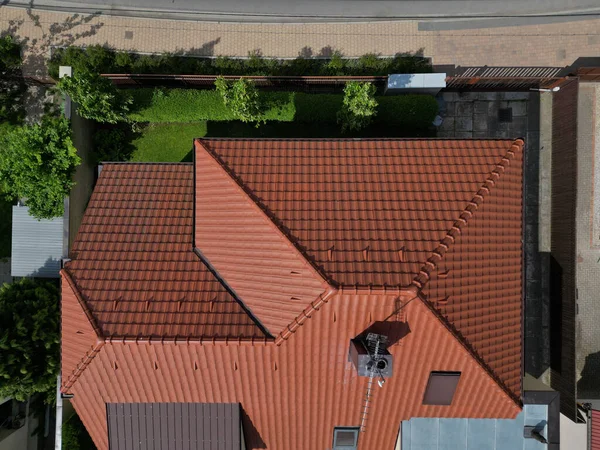checking the cleanliness of the chimney using a drone. Cleanliness is essential for safety and the risk of soot ignition. a drone equipped with a camera inspects high on the roof. chimney work, red