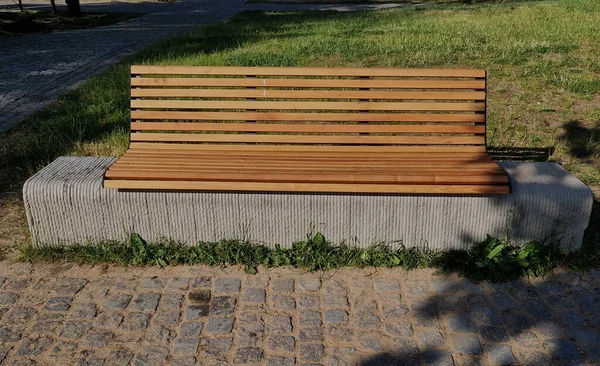 Park Bench Has Concrete Tube Base Flattened Sides Bench Printed — Stock Photo, Image