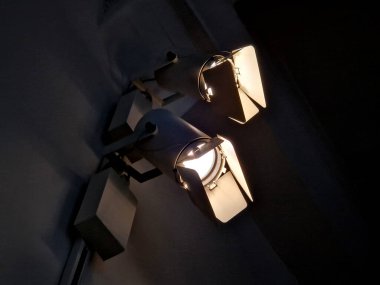 column with special lighting for scenic lighting of public and historic buildings in city. Halogen lamps have side flaps that shade so that they do not dazzle other people, drivers and neighborhood