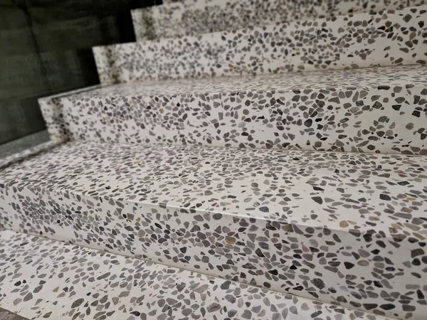 Initially, components such as polyester and vinyl ester resins were used as binder resins. Today, most terrazzo installed is based on epoxy terrazzo. Recycled aggregates used include glass, porcelain