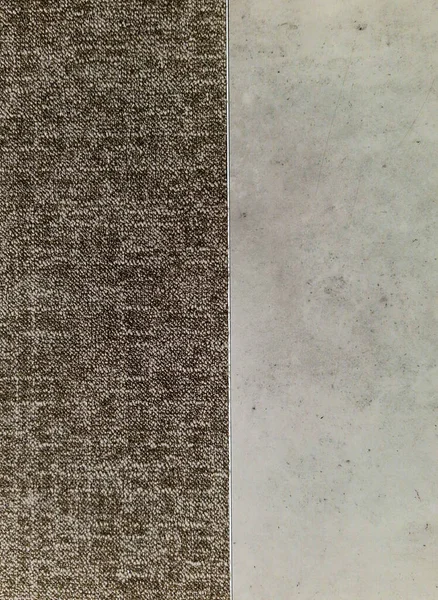 connecting the surfaces to each other using a metal bar. combination of vinyl plastic floor covering and gray dencent carpet without interface