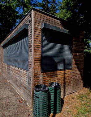 residential brown container with window door. modular living anywhere. surgery or testing center. locker room background for athletes or builders on construction site