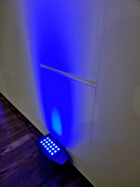column with special lighting for scenic lighting of public and historic buildings in city. Halogen lamps have side flaps that shade so that they do not dazzle other people, drivers and neighborhood
