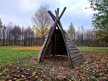 teepee tent is equipped on the inside with furniture for groups of children in kindergarten. outdoor lessons combined with games in the meadow and drawing will not hurt clipart