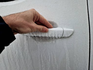 freezing rain, crusted the car. window handle and car hood. ice crunching when handling the door, frostbite clipart