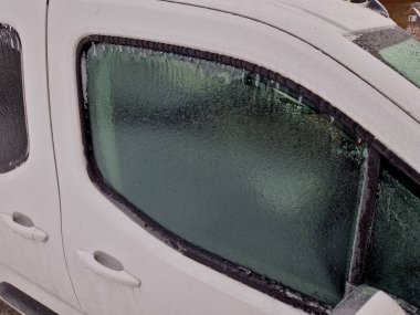 freezing rain, crusted the car. window handle and car hood. ice crunching when handling the door, frostbite clipart