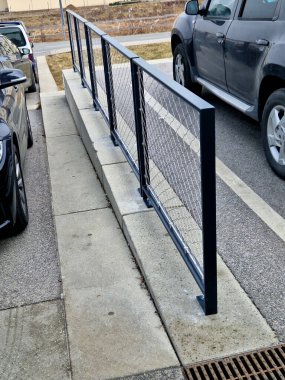 Terrace fencing, railings of metal pipes filled with steel cables cable mesh. fencing wire stainless steel fence. wooden floor, dance floor in the park, wire, galvanized railings, railing,