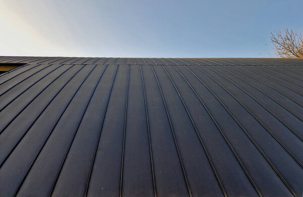 sheet metal roof, arch of the hall made of individual folded sheets of sheet metal.