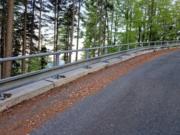 The narrow mountain roads are only plowed. snow barriers line the edge paths. sheet metal downpipes will protect against slipping into a forest ravine. a challenging ride on an untreated salt road