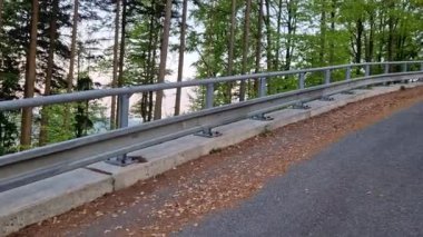 The narrow mountain roads are only plowed. snow barriers line the edge paths. sheet metal downpipes will protect against slipping into a forest ravine. a challenging ride on an untreated salt road