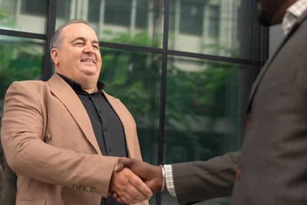 Businessmen shaking hand. Success business dealing negotiation deal.