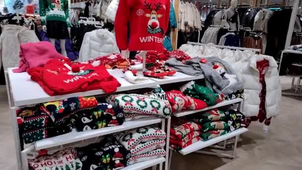 Colourful Christmas Ugly Sweaters Hats Mittens Shelves Mall Ready Sale — Stock Video