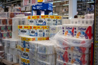 Chisinau, Moldova - November 14, 2022: Packs Toilet Paper in Assortment On Supermarket Shelf Metro Cash Carry, selective focus, shallow depth of field