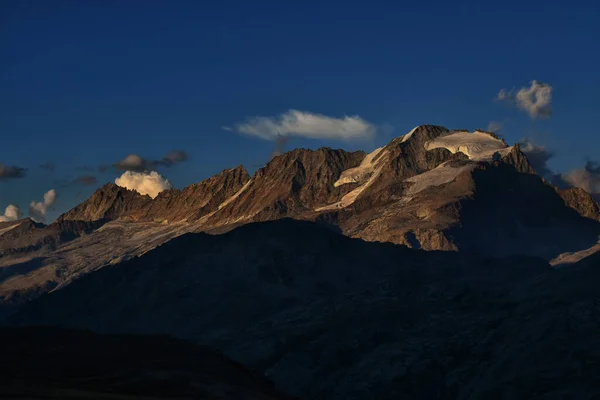 stock image Evening view of the Gran Paradiso, taken from the Tre Becchi lakes