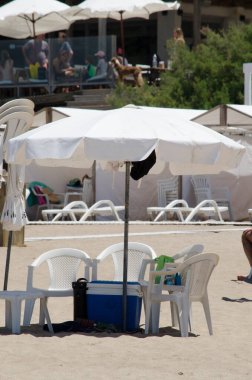 beach umbrella on the sand. Atlantic coast of the Argentine Republic to spend the summer