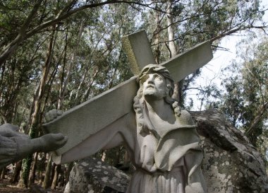 Jesus carrying the cross on the Via Crucis. Via Crucis sculpture in Tandil, Buenos Aires province. christian symbol